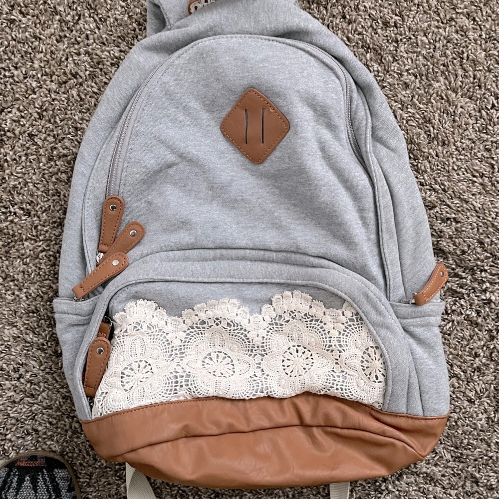 Kinichi blue grey lace backpackk